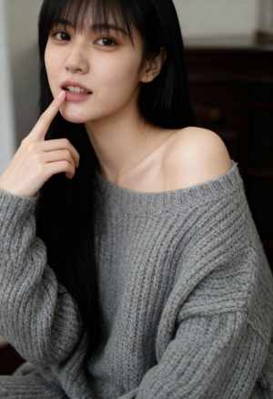 灰色のオフショルダー セーターを着た長い黒髪のアジア系の若い女性が、口元に指を当てて...。