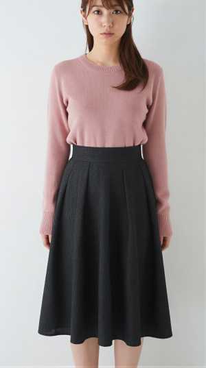 グレーのセーターを着た女性のポートレート