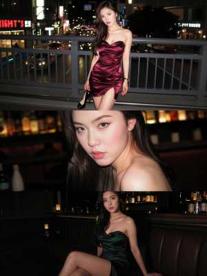 ストラップレスのワインレッドのサテンのドレスを着て、夜の豪華な環境でポーズをとる若い...。