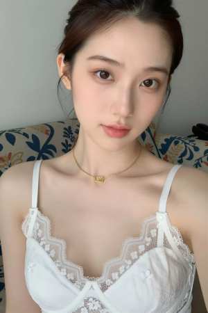 白のレースを着た女性のポートレート