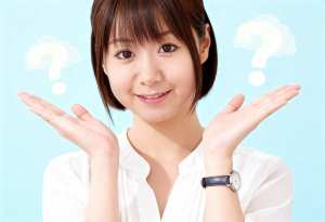 画像の中央に、白いブラウスを着た短い茶色の髪と茶色の目をした若いアジア人女性の写実的...。