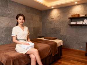 部屋の中央にあるマッサージ テーブルに若い女性が座っている、スパ環境の写実的なレンダリング。