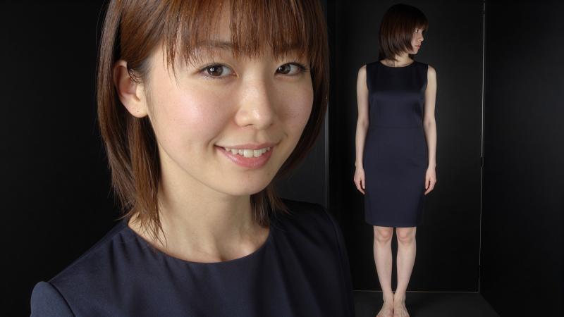 黒いドレスを着た女性のポートレート写真